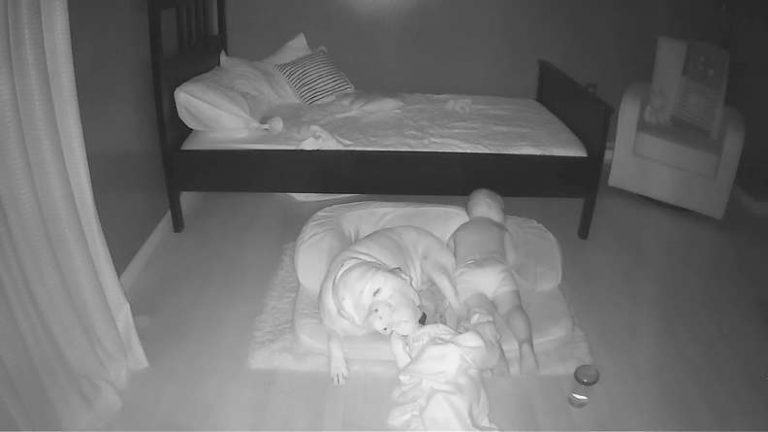 Surveillance Camera Captures Little Boy Sneaking Out Of Bed Just To Sleep With His Dog (VIDEO)